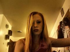 wildgirl w/ a soft sensual side, long red hair, bue eyes ,legs for days, 23