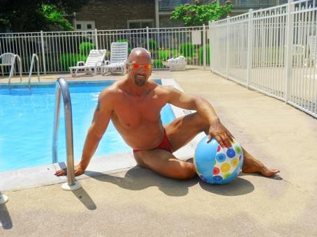 Masseur providing deep tissue and sports massage, 53