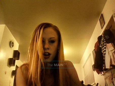 wildgirl w/ a soft sensual side, long red hair, bue eyes ,legs for days, 23