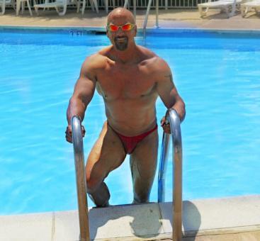 Masseur providing deep tissue and sports massage, 53
