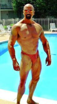Masseur providing deep tissue and sports massage, 53